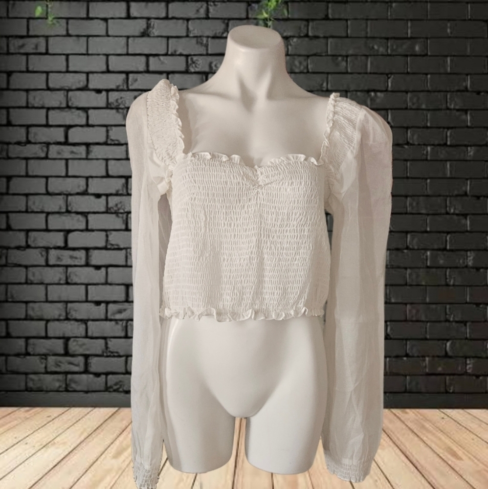 A Peach Elegant White Smocked Women's Top